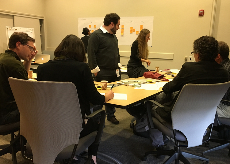 Design workshop — team review session around the concept boards